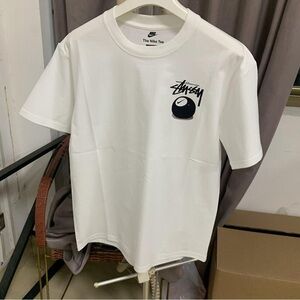 Stussy White Short Sleeve Tee with Black Logo